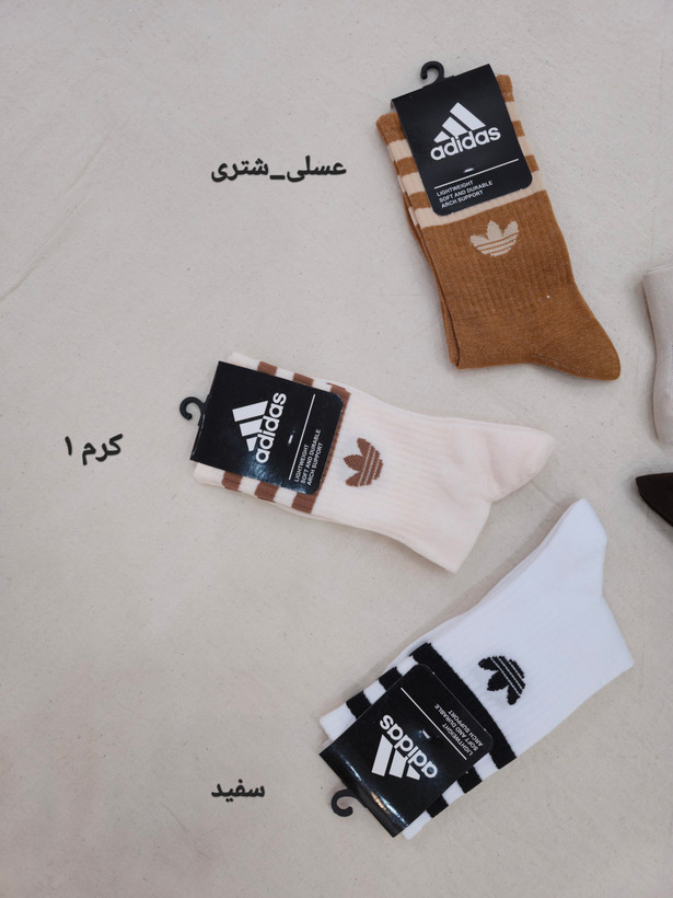 جوراب ورزشی ساق بلند زنانه مردانه مدل آدیداس جوراب ساق بلند آدیداس